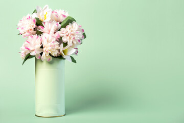 Flowers in a metal can with copy space