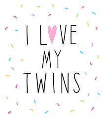 A poster with the words "I love my twins" on a white background with a pattern of multicolored beans.
