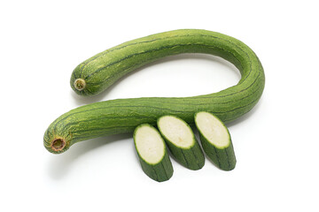 1 Long Luffa Sponge Gourd (Luffa Cylindrica Gourd) and 3 sliced isolated on a white background.