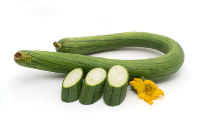 1 Long Luffa Sponge Gourd (Luffa Cylindrica Gourd) and 3 sliced and flower isolated on a white background.