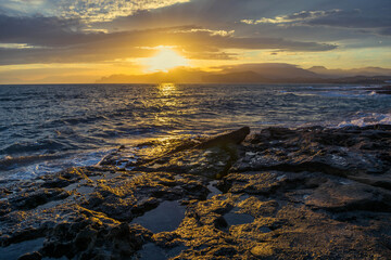 Sunset by the sea