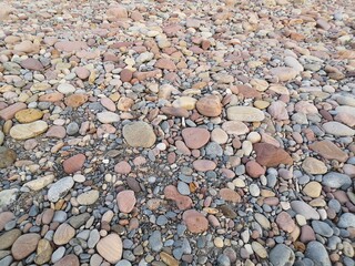 Beach pebbles wallpaper by the mediterranean coast