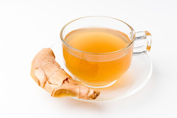 Ginger water and fresh ginger isolated on a white background. Ginger is a useful herb and has medicinal properties.