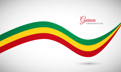 Happy independence day of Guinea. Creative shiny wavy flag background with text typography.
