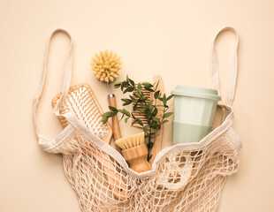 Zero waste and eco-friendly lifestyle. Bathroom and kitchen supplies.in a cotton bag, top view, on a beige background