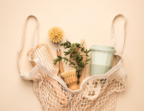 Zero waste and eco-friendly lifestyle. Bathroom and kitchen supplies.in a cotton bag, top view, on a beige background