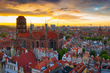 Amazing architecture of the main city in Gdansk at sunset, Poland. Aerial view of the St. Mary Basilica © Patryk Kosmider
