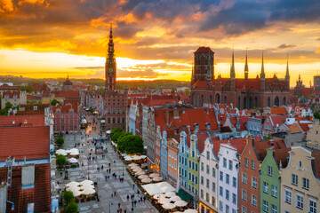 Amazing architecture of the main city in Gdansk at sunset, Poland. Aerial view of the Long Market, Main Town Hall and St. Mary Basilica © Patryk Kosmider