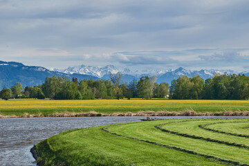 Fototapeta premium Water, meadows, forest, mountains and sky
