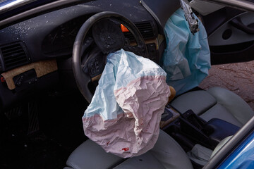 Airbags in a car after accident on a road
