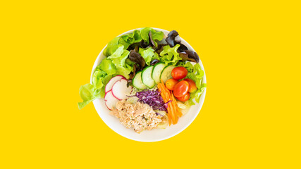 Tuna salad with yellow isolated background.
