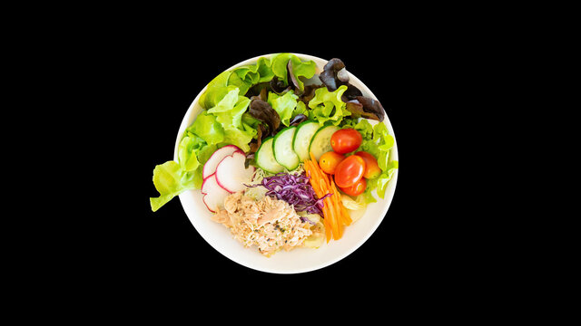Tuna salad with black isolated background.
