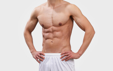 male torso - isolated male bodybuilder on white background