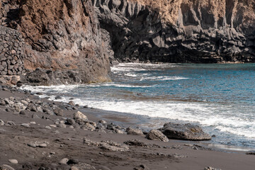 Scenic view of a blue ocean and rocky cliffs in the Canary Islands - Powered by Adobe