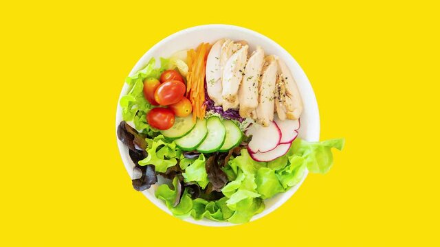 Spinning salad bowl on different isolated background.