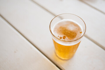 Typical Americano Glass with cold beer at a bar in Brazil