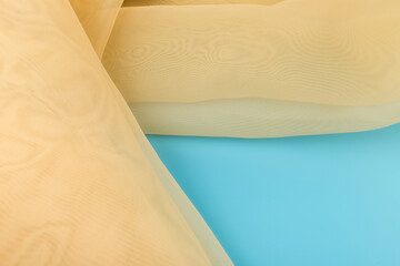 Yellow color tulle fabric texture  with beautiful closeup and elegance detail fabric background