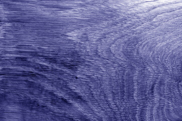 Fototapeta na wymiar Old oak board texture as background with blur effect in blue tone.
