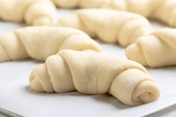 Fototapeta na wymiar Process of making crescent rolled buns.