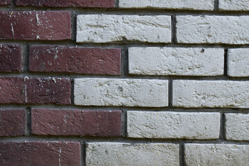 brown fading into a white brick wall background