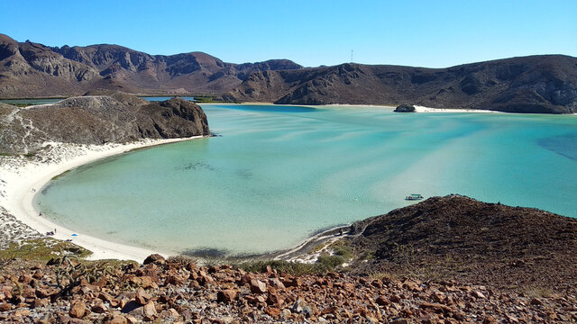 Beautiful view of the mountains surrounding the water in Hongo De Balandra Pichilinque Mexico