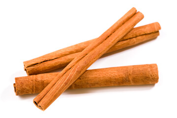 cinnamon quills isolated on white background