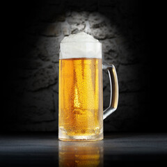 Cold beer on desk and dark background with shadows. 