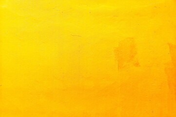 Abstract​ yellow​ and​ orange​ color​ background​ cement​ wall