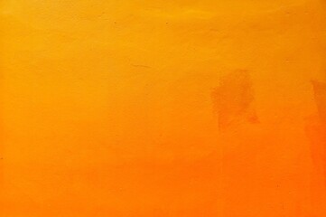 Abstract​ yellow​ and​ orange​ color​ background​ cement​ wall