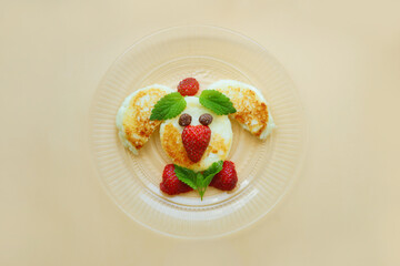 dessert with strawberry. Cheese cake for breakfast. Funny dish for Kids. Food art. 