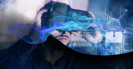 Composition of blue light trails and online security padlock over man wearing vr headset