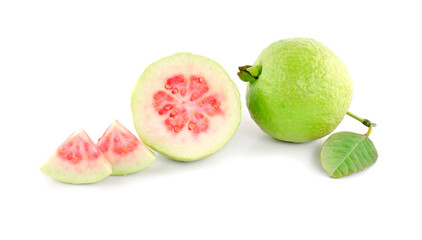 Isolated guava. One whole green guava fruit and a half with pink flesh on a branch with leaves isolated on white background
