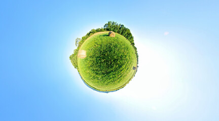 Stereographic projection of a green field with trees. 360 degree panorama. Globe panorama. - 435843718
