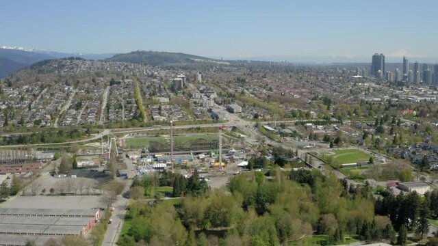 Wide, sweeping aerial view of Hastings Sunrise and North Burnaby Heights and the TransCanada Highway One in Vancouver BC Canada