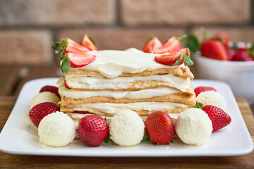 Homemade meringue Keto cake with strawberries. High quality photo