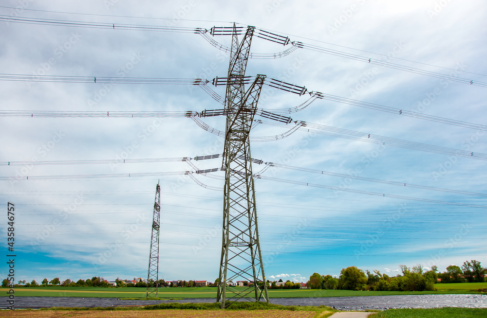 Wall mural agriculture field with high-tension pylons, power line transmission tower, high voltage towers again