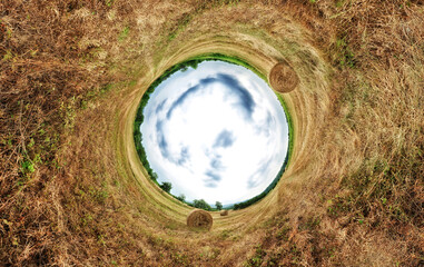 Stereographic projection of a a hay bale field. 360 degree panorama. Tunnel panorama. - 435846971
