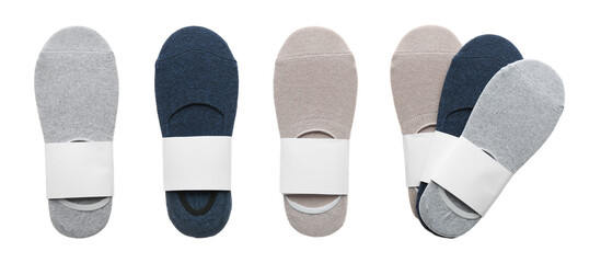 Pairs of cotton socks with blank labels on white background, collage. Banner design