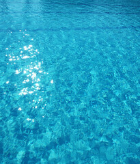 Fototapeta na wymiar Summer blue swiming pool water background