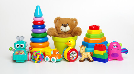 Many colorful toys isolated on white