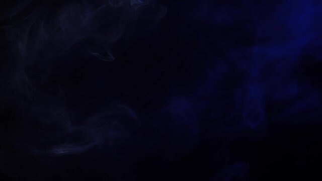 Blue and white smoke on black background slow motion 4k 60fps