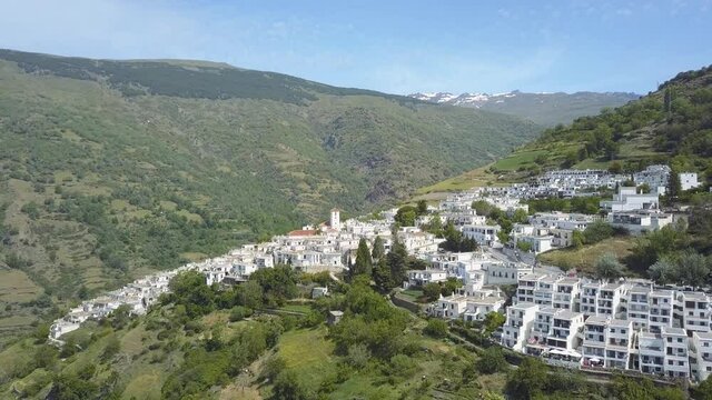Aerial view of the village of Capileira in the valley of Poqueira, La Alpujarra, Granada, Spain.