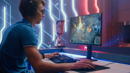 Professional eSports Gamer Plays RPG MOBA Mock-up Video Game with Super Action and Fun Special Effects on His Personal Computer. Cyber Gaming Online Tournament Championship
