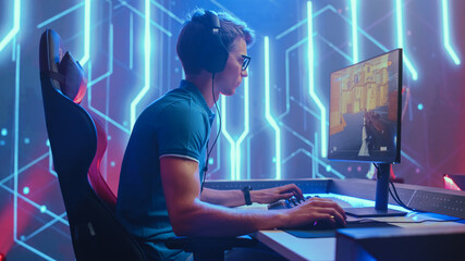 Professional eSports Gamer Plays Mock-up 3D First Person Shooter Video Game His Personal Computer. Cyber Gaming Tournament / Championship. Medium Shot © Gorodenkoff