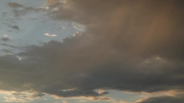 Dramatic sky. Time lapse The movement of clouds at sunset. Natural background