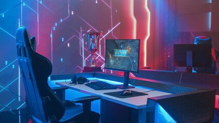 On Cyber Gaming Championship: Empty Gaming Station with Player's Computer Screen Showing Video Game...