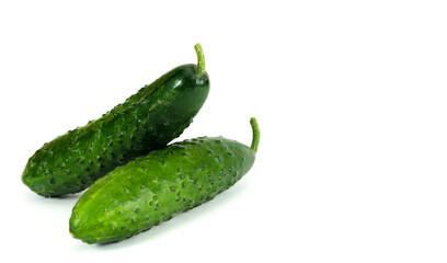 Fresh green cucumbers on white background