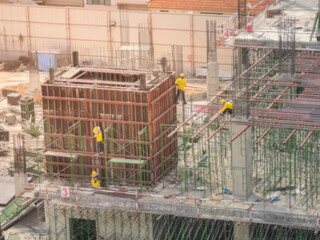 Abstract blur aerial view of construction worker in construction site ,abstract blur background