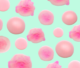 Pink liquid soap isolated on pastel blue color. Abstraction of pink spots. Beautiful blots. Pattern