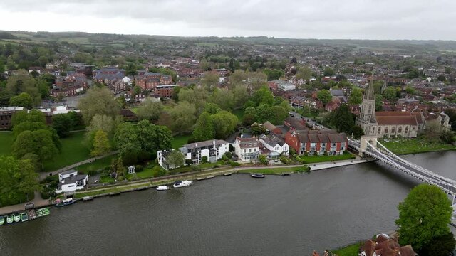 Marlow town Buckinghamshire on River Thames UK aerial pan over town 4K